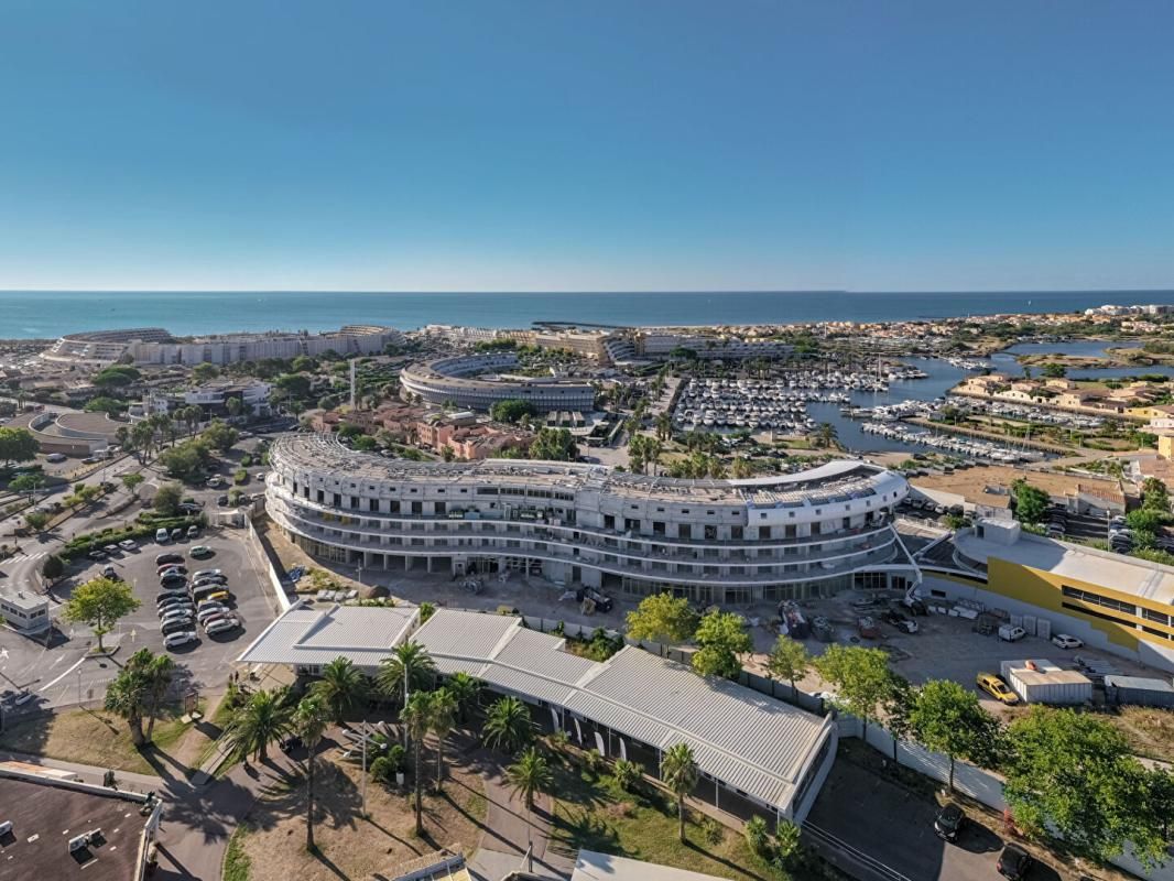 LE CAP D'AGDE Le haut de gamme s'invite dans ce T1 de près de 33 m² exposé Ouest au sein du village naturiste du Cap d'Agde 3