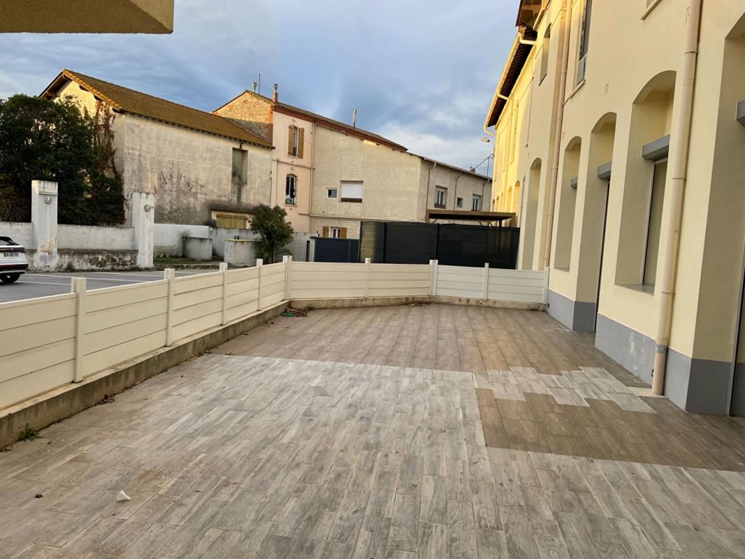 Appartement  de 118 m²  proche commerces  - terrasse de 60 m2