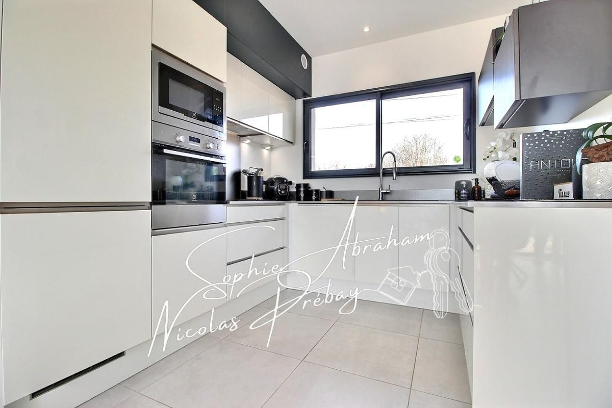 OLIVET Maison contemporaine avec garage, carport et jardin clos 4