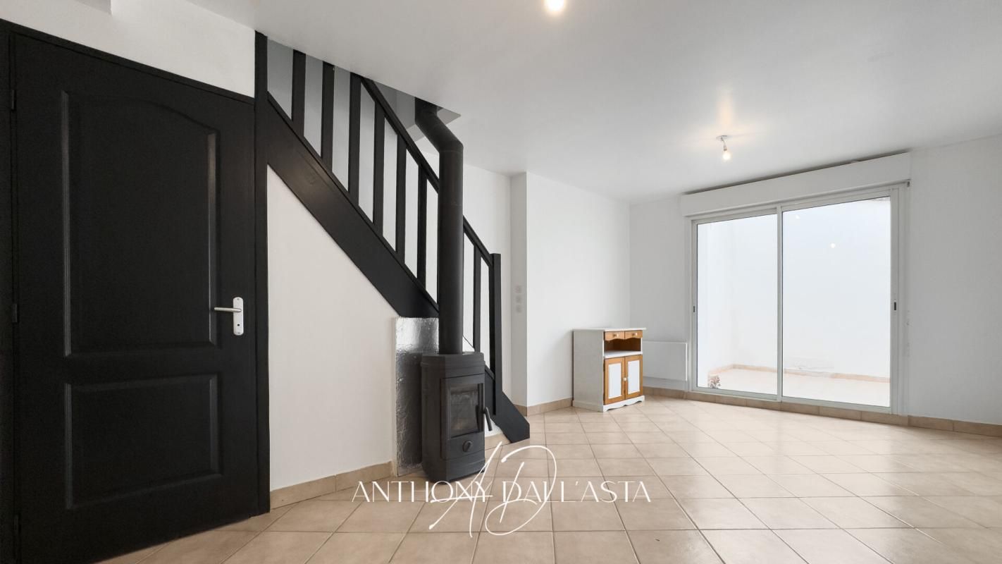 EXCLUSIVITÉ- ALZONNE- 2 CHAMBRES- SÉJOUR- CUISINE- COUR