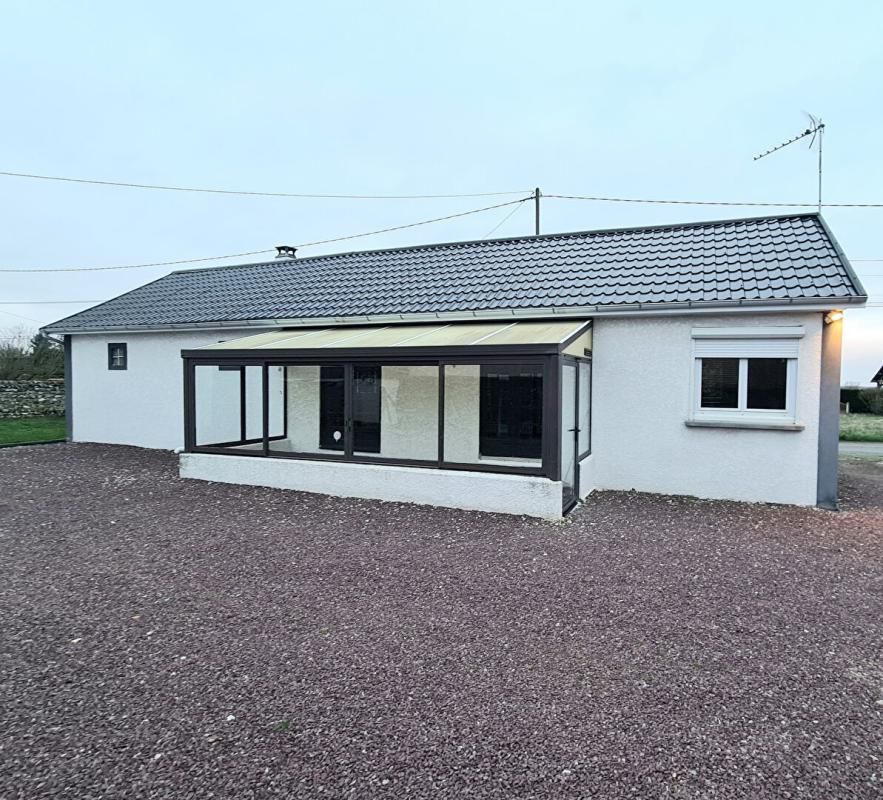 Ailly - Maison de plain pied de 85.50 m2 - une grande chambre - 2 garages sur un terrain plat de 644 m2- Prix : 157.000