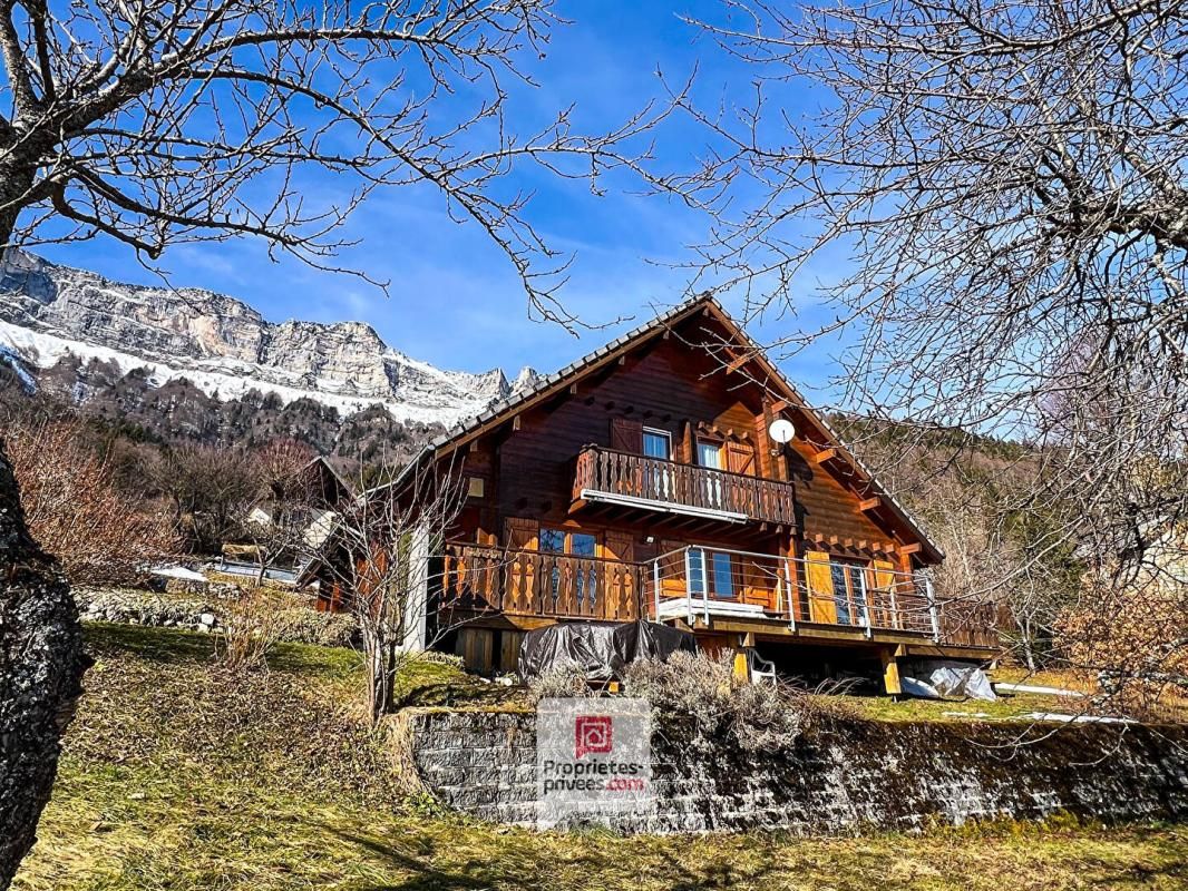 SAINT-HILAIRE Plateau des Petites Roches (38660) - Chalet T6 en madriers + studio + carport + jardin 1