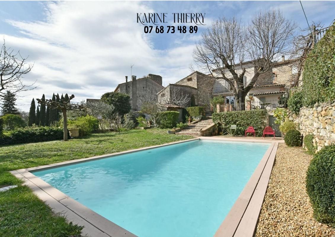 RIBAUTE-LES-TAVERNES Magnifique maison de village de caractère avec sa piscine 1