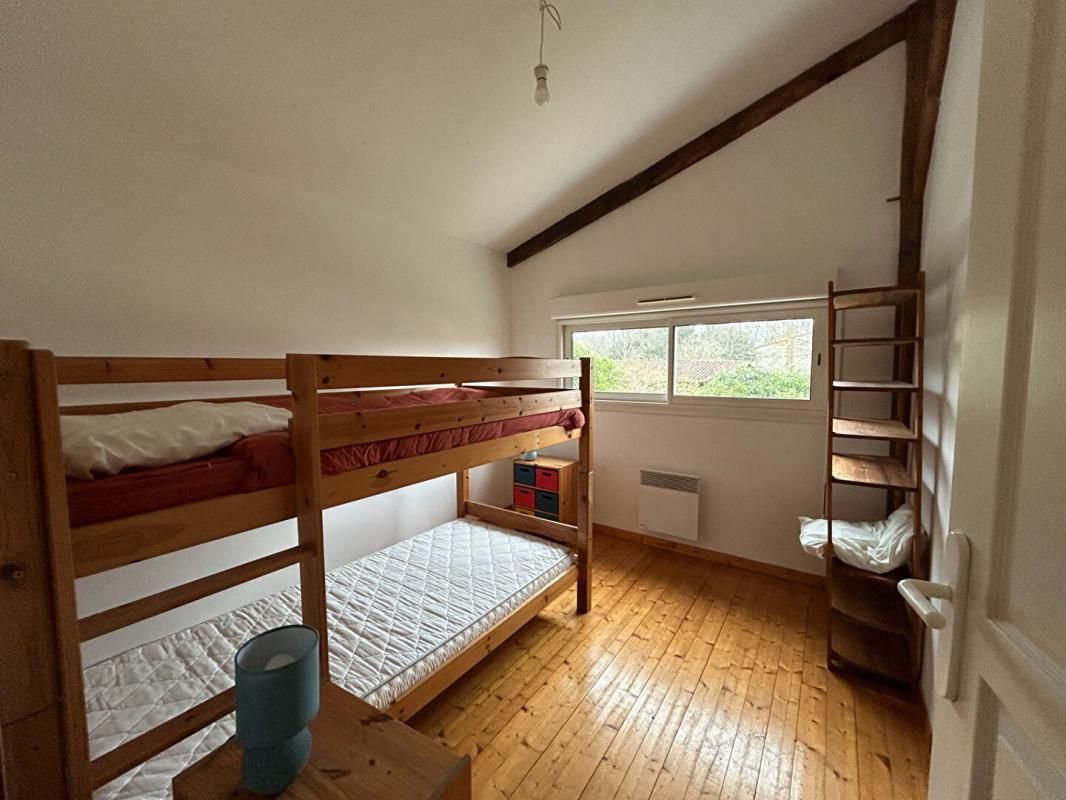 SAINT-LAURENT-MEDOC Ancienne grange rénovée en maison familiale 110 m² À 30 min de l'océan 4