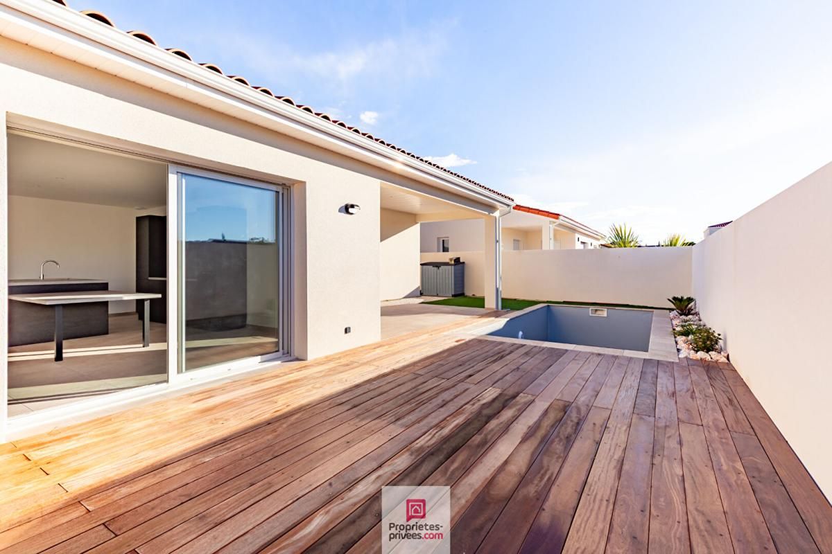 NISSAN-LEZ-ENSERUNE Villa contemporaine  de plain-pied.  4 pièce(s) 102.82m2 1