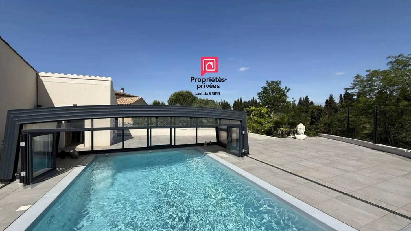 BAGNOLS-SUR-CEZE Maison Bagnols Sur Ceze 5 pièce(s) 144 m2 4