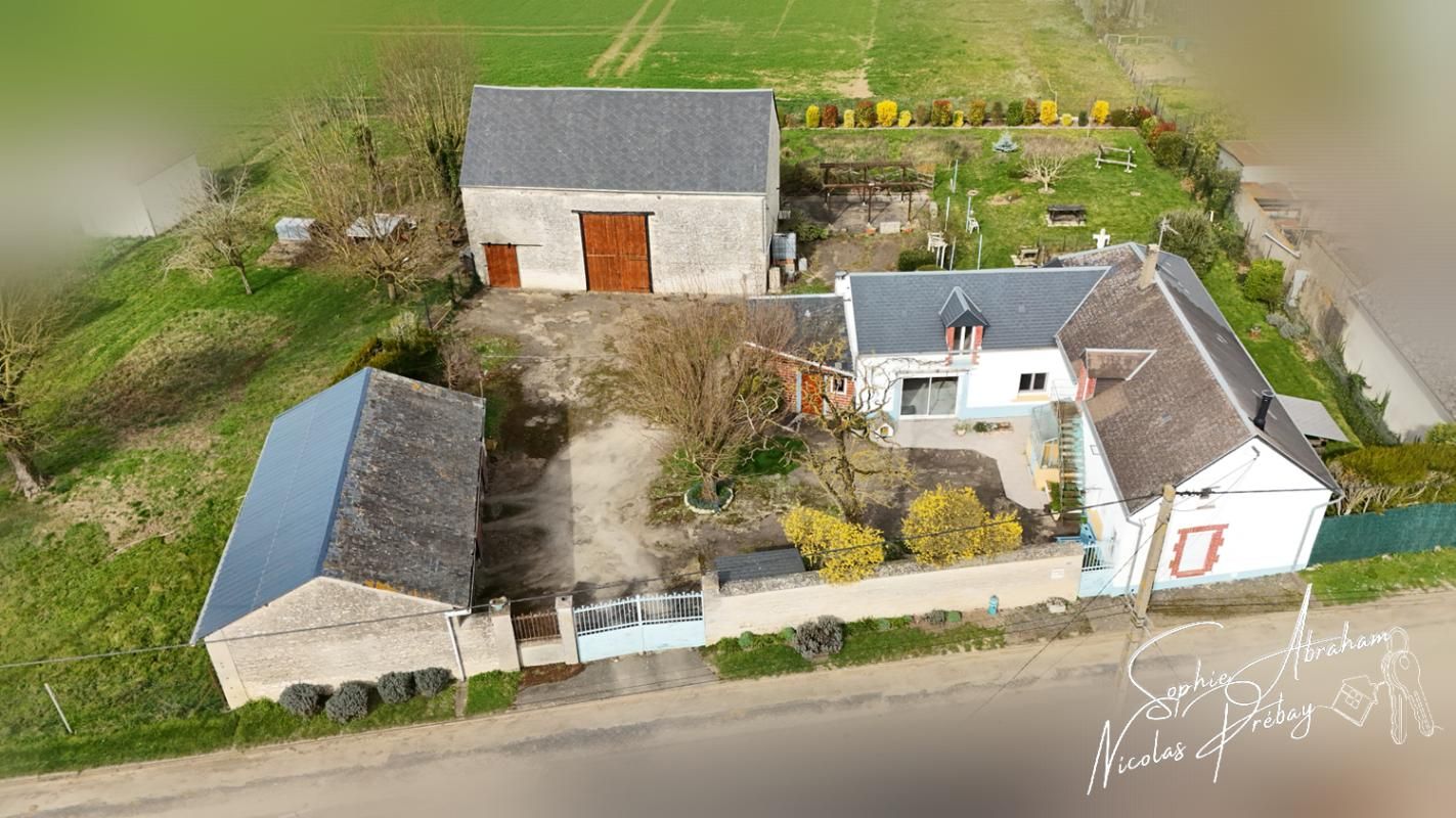Fermette avec dépendances et terrain constructible