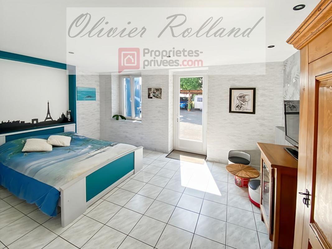 SAINT-SYLVAIN-D'ANJOU Magnifique longère rénovée avec goût au coeur d'un superbe parc 3