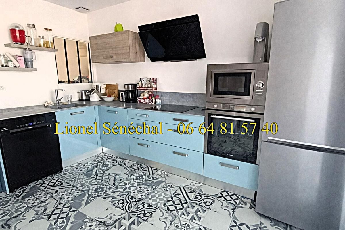 SAVIGNE-L'EVEQUE Maison lumineuse entièrement rénovée et peu énergivore de 85 m2 sur une parcelle de plus de 600 m2 3