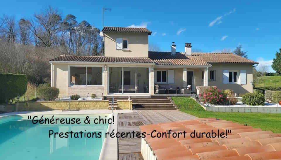 Maison chaleureuse et facile à vivre! 2 cuisines. 4/5 chambres. 2 salles d 'eau.2 wc. Sous-sol. Garage. Piscine 11 X 6M. 2 Terrasses. Jardin clos de 2678 m2