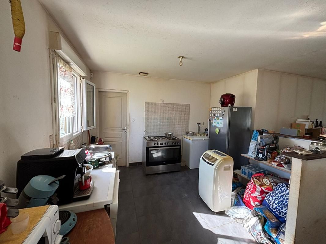 SICHAMPS Maison Sichamps 5 pièces 92.9 m2 - 3 chambres - louée - investisseur 4