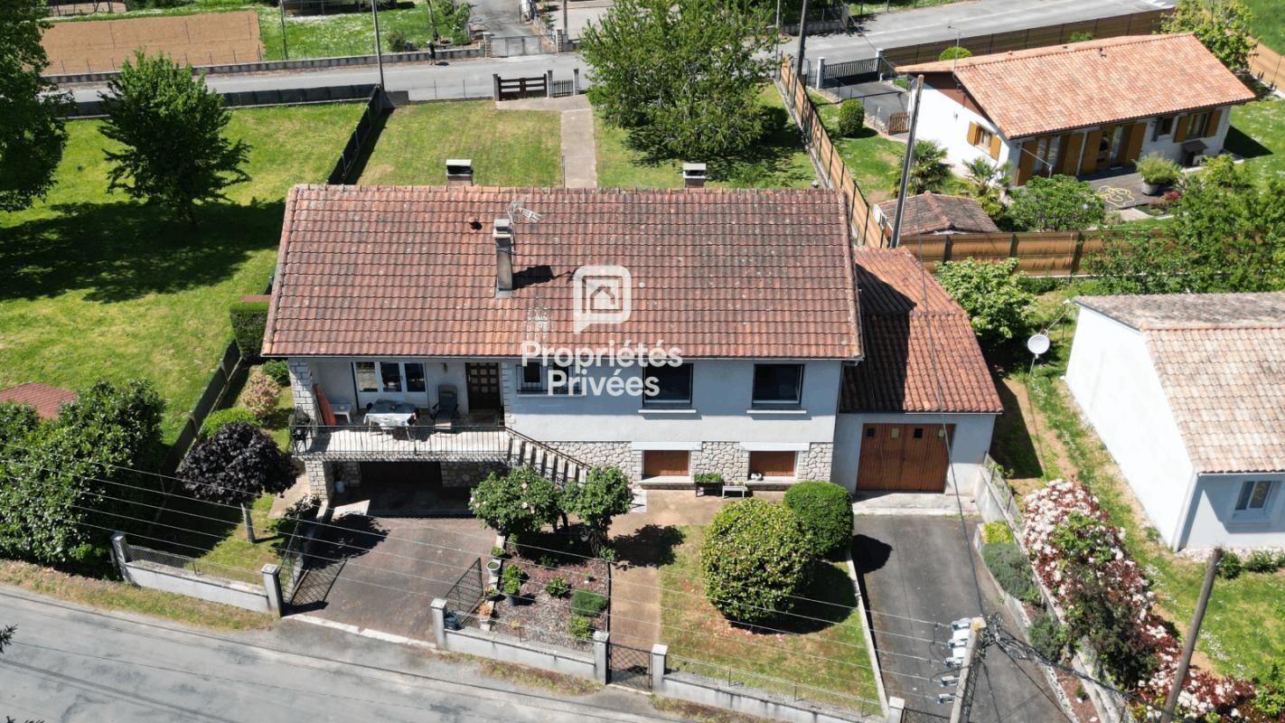 NONTRON NONTRON : Maison saine (DPE D), 100 m² habitables + Garage XXL de 41 m² ! 1