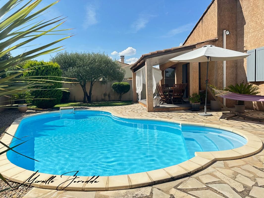 Maison Redessan 5 pièces 3 chambres de101 m² avec piscine terrasse et garage