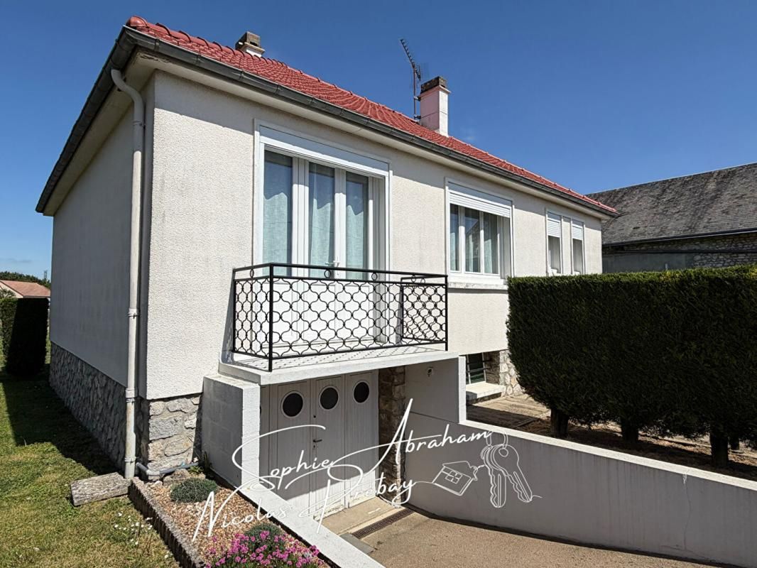 TOURY Maison individuelle avec sous-sol et jardin 1