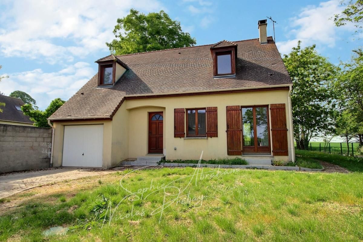 JANVILLE Maison individuelle avec garage et jardin arboré 1