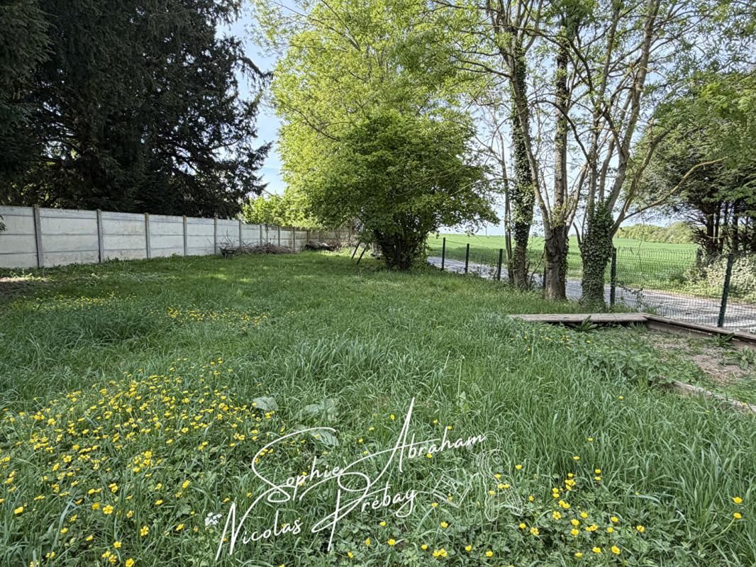 JANVILLE Maison individuelle avec garage et jardin arboré 2