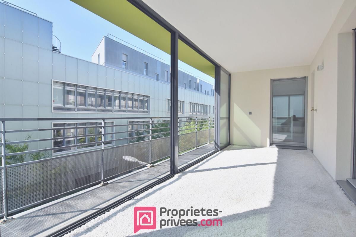 BOULOGNE-BILLANCOURT Appartement  3 pièces 66,03 m² Carrez  avec 18 m² de jardin d'hiver et 8 m² de balcon filant 2
