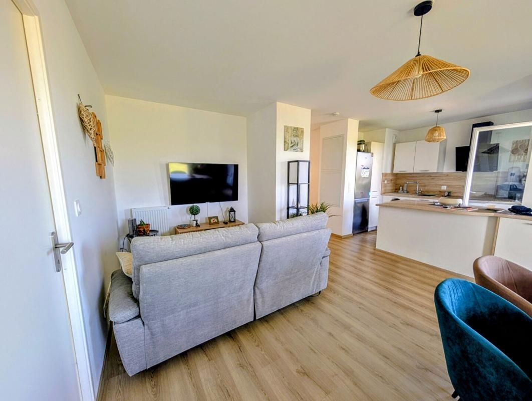 BLAINVILLE-SUR-ORNE Opportunité rare : appartement T3 de 2023, loggia plein Ouest et vue sur la plaine de Caen 2