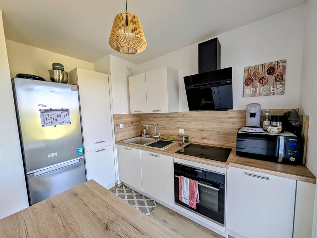 BLAINVILLE-SUR-ORNE Opportunité rare : appartement T3 de 2023, loggia plein Ouest et vue sur la plaine de Caen 4