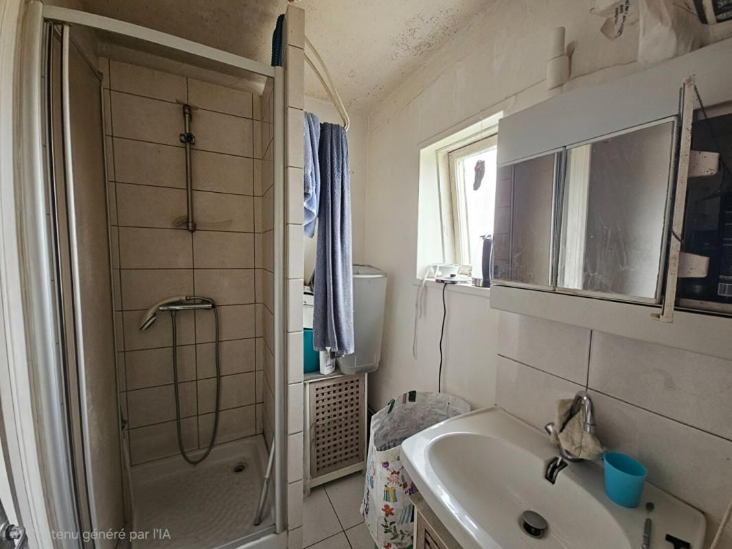 DONVILLE-LES-BAINS Appartement T2 loué - Proche Mairie de Donville 3